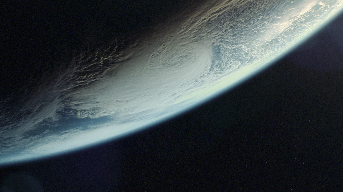 View of Earth from space, partially in shadow